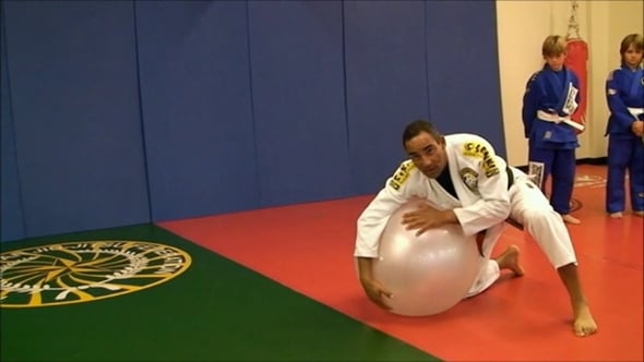 Children learning Brazilian Jiu-Jitsu with João Crus